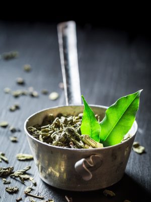 Healthy green tea on black wooden table Green Tea